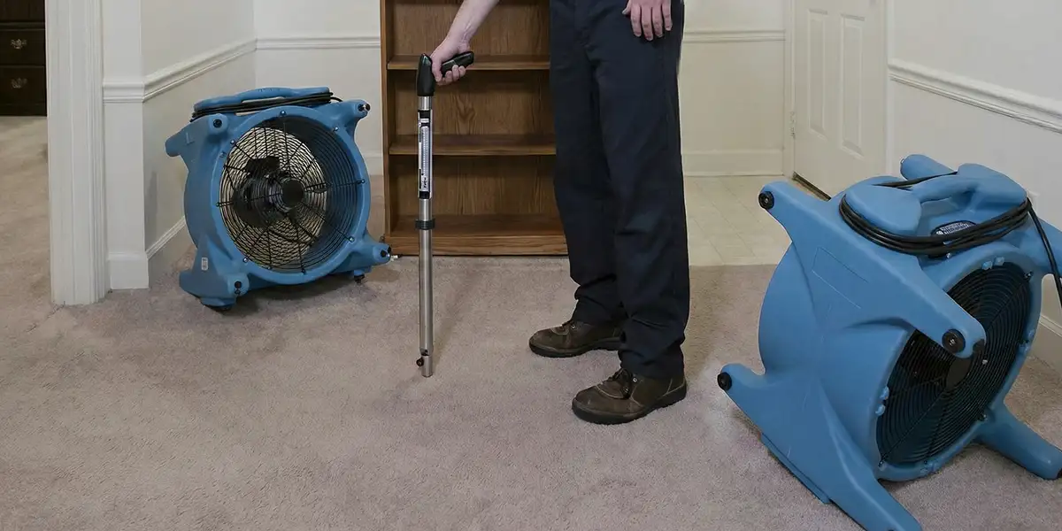 emergency water removal equipment deployed to dry a flooded residential interior in Denver, CO